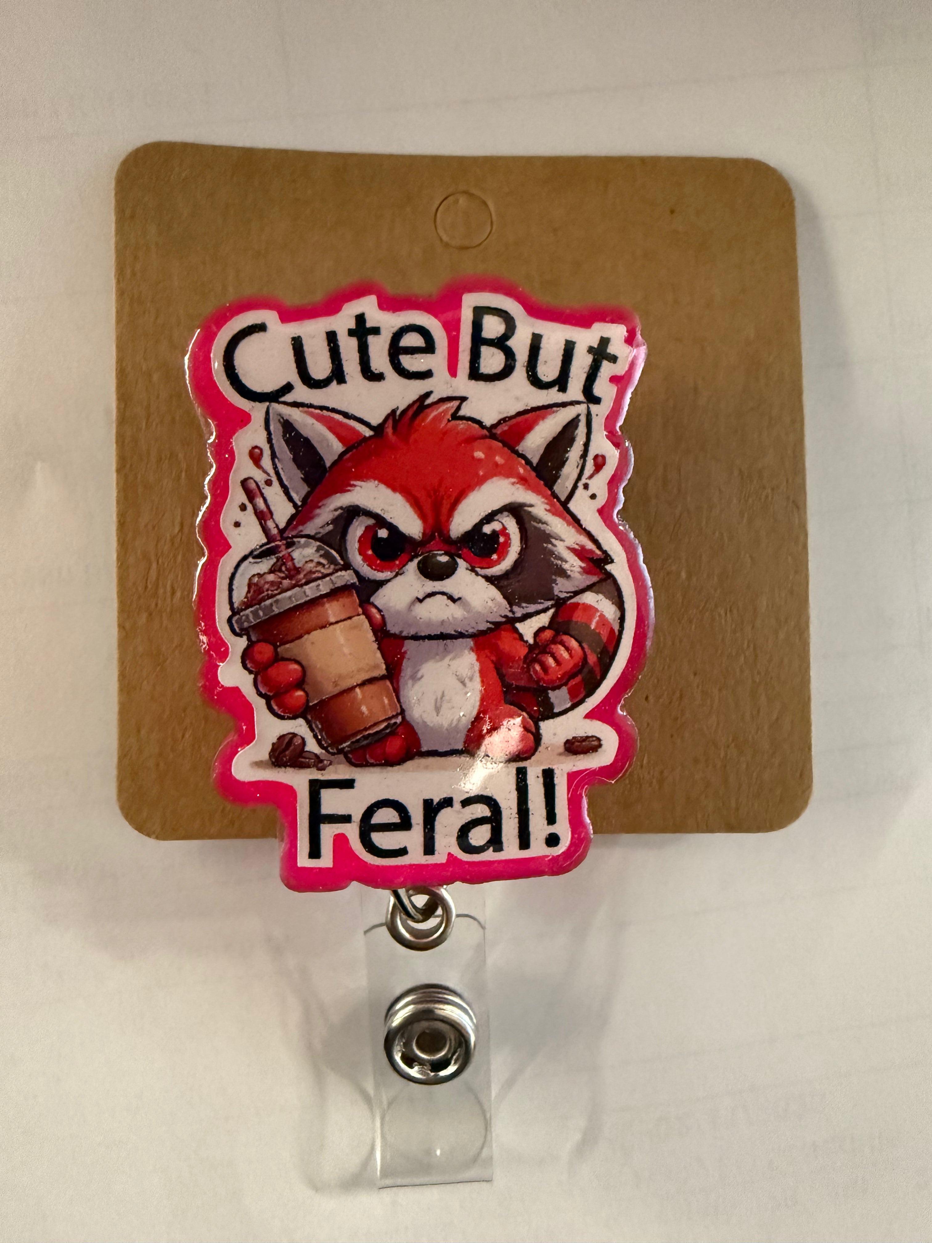 Cute but feral Badge Reel